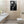 Laden Sie das Bild in den Galerie-Viewer, In einer Gästetoilette hängt eine Bild von einem Gorilla. Der Affe sitzt mit einer Zeitung auf dem Klo und raucht genüsslich eine Zigarette.