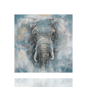 Auf einem Gemälde sieht man einen Elefantenkopf der plötzlich aus dem blauen Nebel erscheint. Das Gemälde wurde mit goldener Metallfolie veredelt.