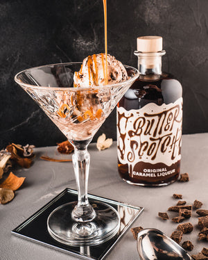 Ob pur genossen oder über zartschmelzendem Vanilleeis geträufelt - dieser Likör ist ein wahrer Gaumenschmaus. Die süße Versuchung harmoniert perfekt mit der Cremigkeit des Eises und sorgt für ein Geschmackserlebnis der Extraklasse.