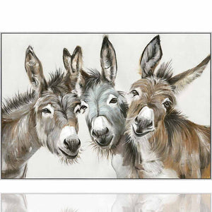 DDrei Esel schauen lachend von einem Acrylgemälde mit Rahmen. Ein ideales Bild für einen Eselhof mit Eselwanderungen oder für Eselfans.