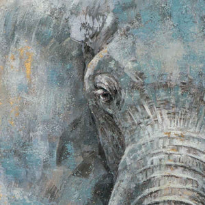 Detailaufnahme von einem blauen Elefantenkopf dem mit goldener Metallfolie veredelt wurde.