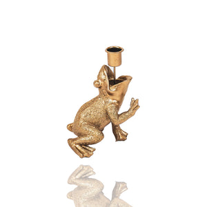 Ein goldener Frosch in dem eine Halterung für eine Stabkerze steckt. Kerzenständer für Froschsammler