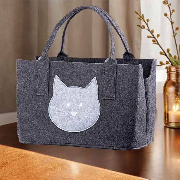 Eine Katze ist auf einer Filztasche. Shopper für Katzenfreunde