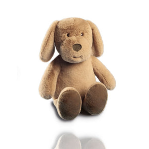 Das Kuschelset Dream Team ist der Hund Max als Stofftier. Er hat einen Reißverschluss auf dem Rücken und im Bauch ist eine weiche Schmusedecke