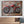 Laden Sie das Bild in den Galerie-Viewer, Rotes altes Motorrad auf einem rustikalen Holzhintergrund. Metallbild von Gilde

