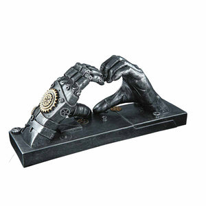 Steampunk Hände die ein herz bilden auf einem grauen Sockel.