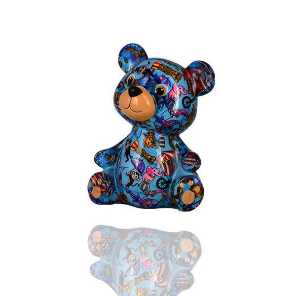 Die Spardose Bär Toto in blau mit Zirkusmotiven von Pomme Pidou ist eine ideale Geschenkidee für Jungs zur Geburt, Taufe oder Kommunion