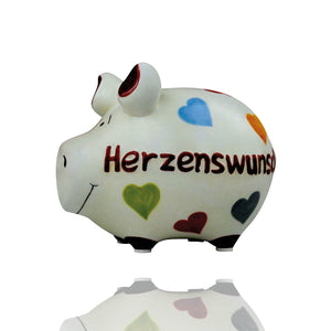 Mit seinem farbenfrohen Design mit vielen bunten Herzen ist dieses Sparschwein oder Spardose nicht nur funktional, sondern auch ein echter Blickfang in jedem Raum.