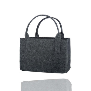 Rückseite einer dunkelgrauen Filztasche der Marke Gilde