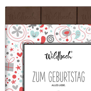 Wildbach Schokolade aus Bayern in einer schönen weißen Verpackung mit der Aufschrift "Zum Geburtstag"