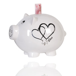 Das Sparschein zur Hochzeit ist eine tolle Geschenkidee. Gerne wird das Sparschwein auch augf Hochzeiten für die Geldgeschenke platziert.Das Sparschwein Big Love ist eine gute Geschenidee für Verliebte und Brautpaare.
