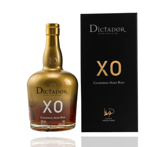 Columbian Rum XO Aurum von Dictador in einer goldenen Flasche mit schwarzem Umkarton.